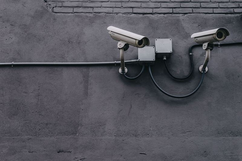 Security cameras mounted on the exterior of a building